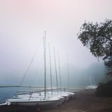 Cold Harbor album cover — boats in harbour fog, photo by Cathy Copeland Titus on Pexels