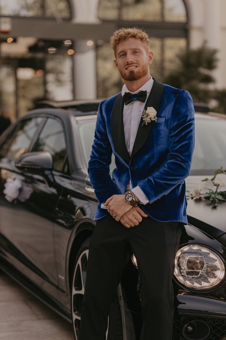 Groom Leaning On Car