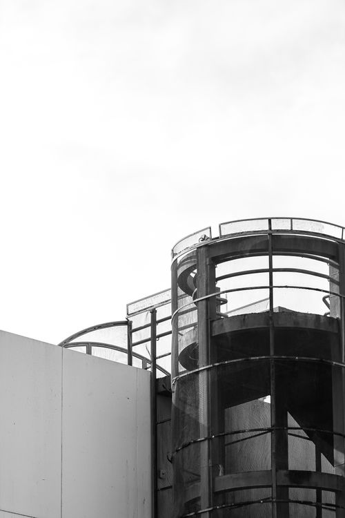 Free A striking modern architectural spiral staircase captured in black and white. Stock Photo