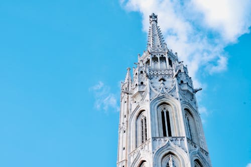 A White Tower Under Blue Sky