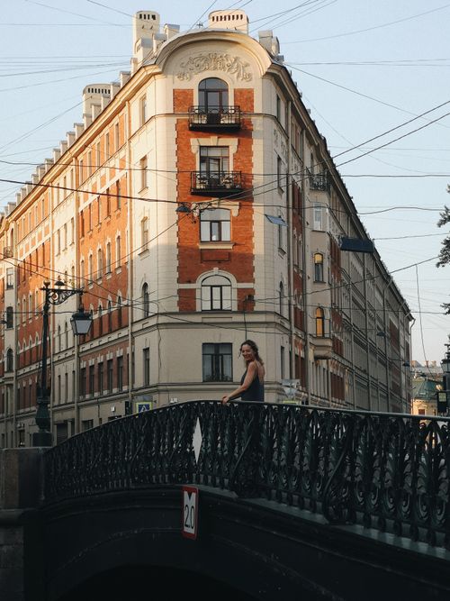 Woman Posing on Bridge · Free Stock Photo