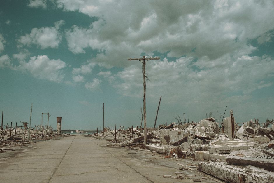 Eerie view of abandoned ruins in CABA, Argentina under a dramatic cloudy sky.