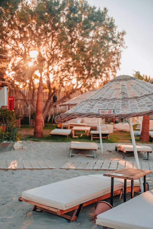 Sunbeds under Umbrellas 