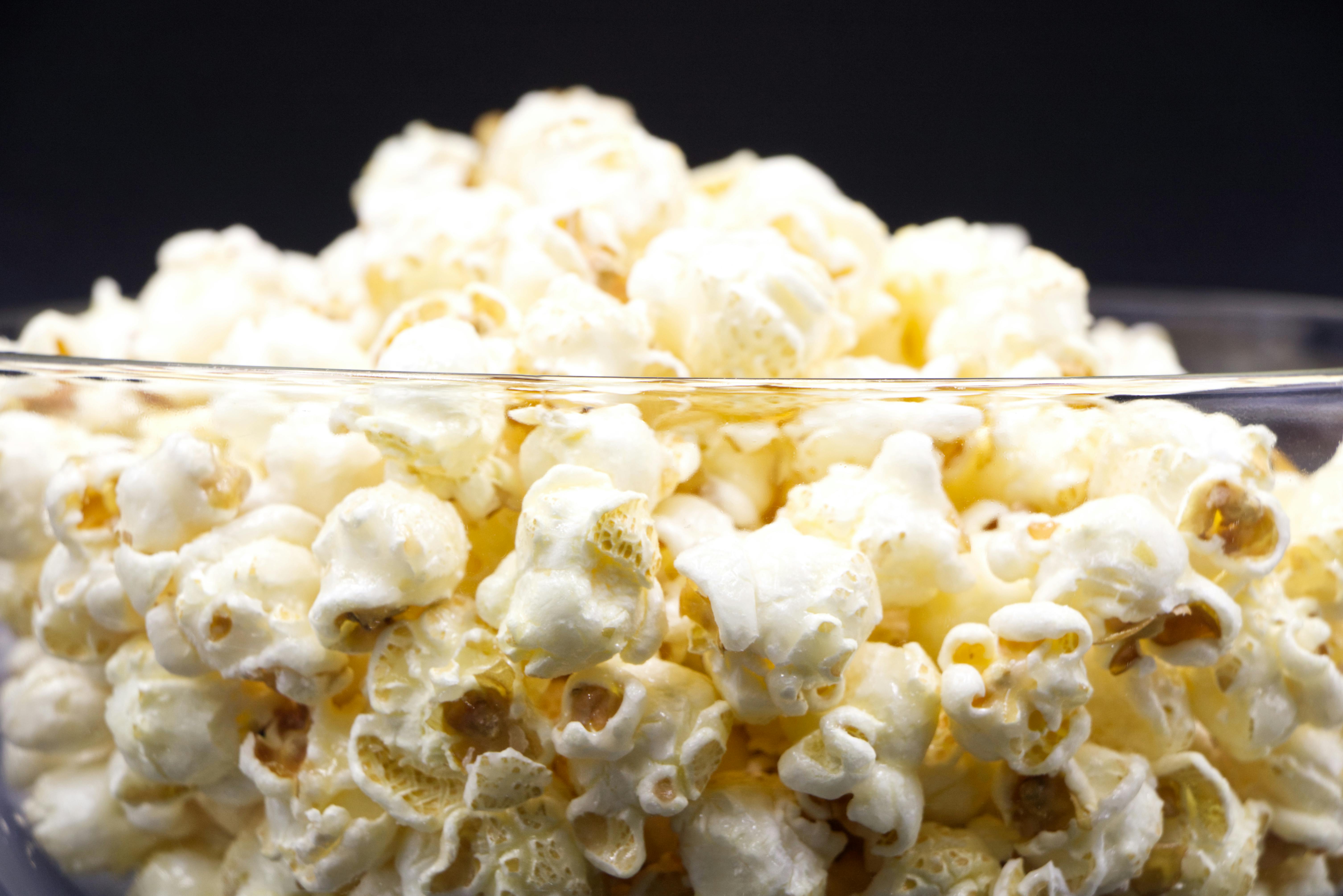 CloseUp Shot of Popcorn in a Glass Bowl · Free Stock Photo