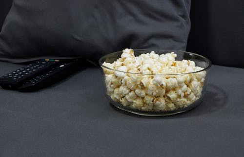 Free Popcorn in Clear Glass Bowl Stock Photo