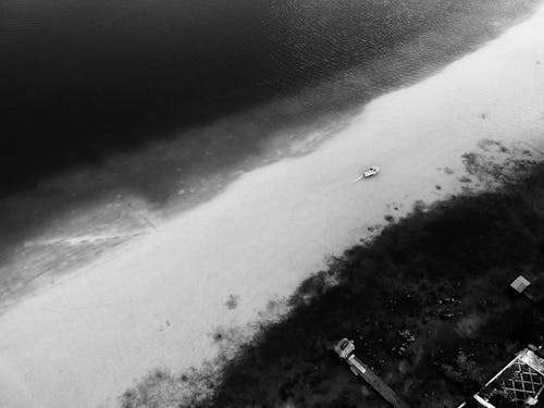 Grayscale Photo of the Beach