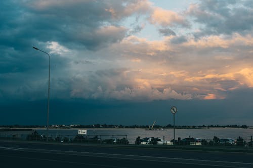 A Bay under a Cloudy Sky