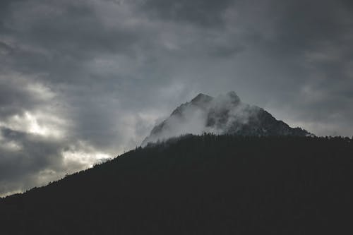 Foggy Mountain under Gray Sky