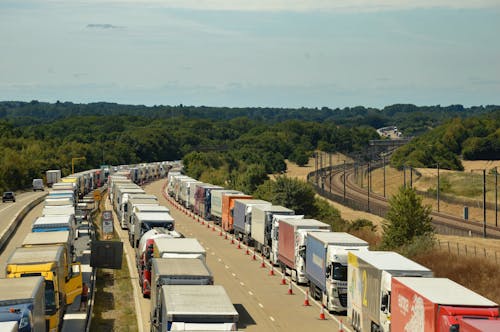A Heavy Traffic of Trucks on a Road