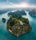 Aerial Photography of Rocky Tropical Islets at Sunrise