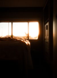 Sunrise through a bedroom window, photo by Erik Schereder on Pexels