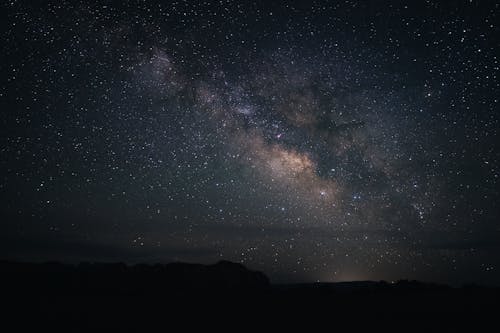 Free Silhouette of Mountain Under Starry Night Stock Photo