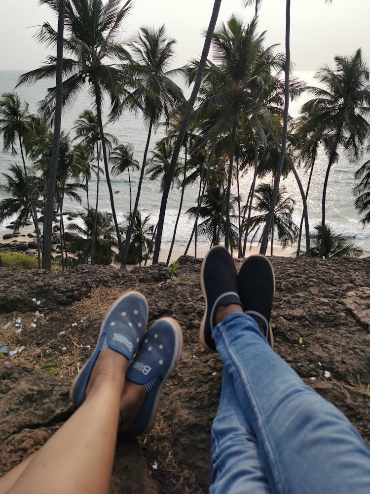 A Couple Wearing Slip-on Shoes