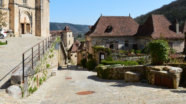 Explore a quaint medieval village with cobblestone streets and historic architecture.
