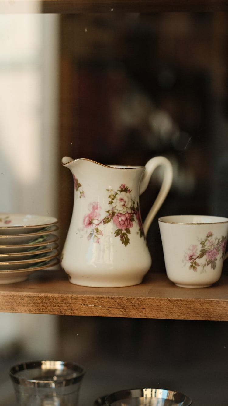 Jug And Cup On Shelf