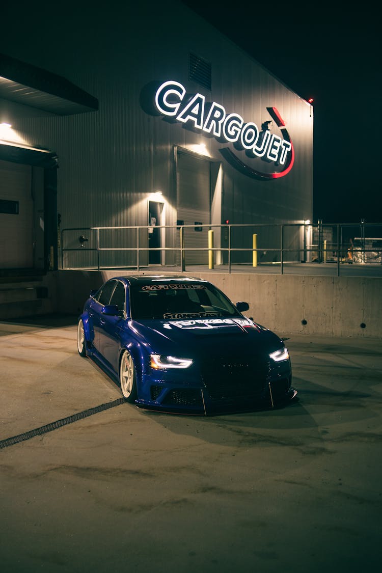 Car On A Parking Lot At Night