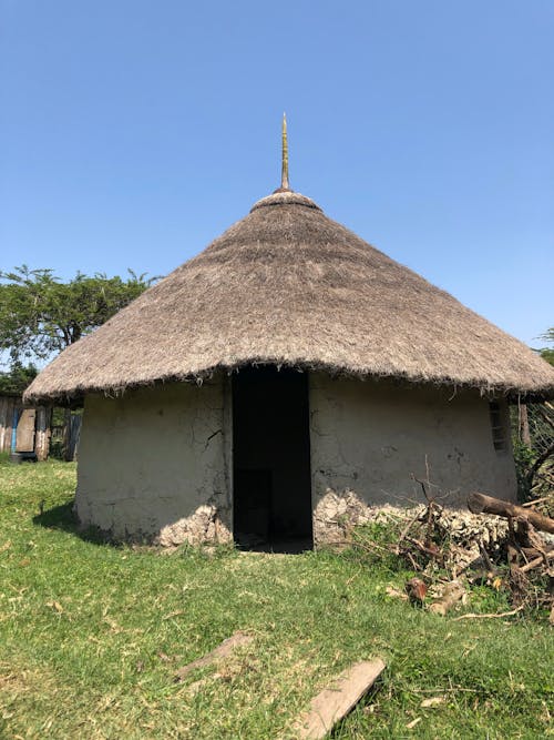 Old Hut with Straw Roof in Countryside