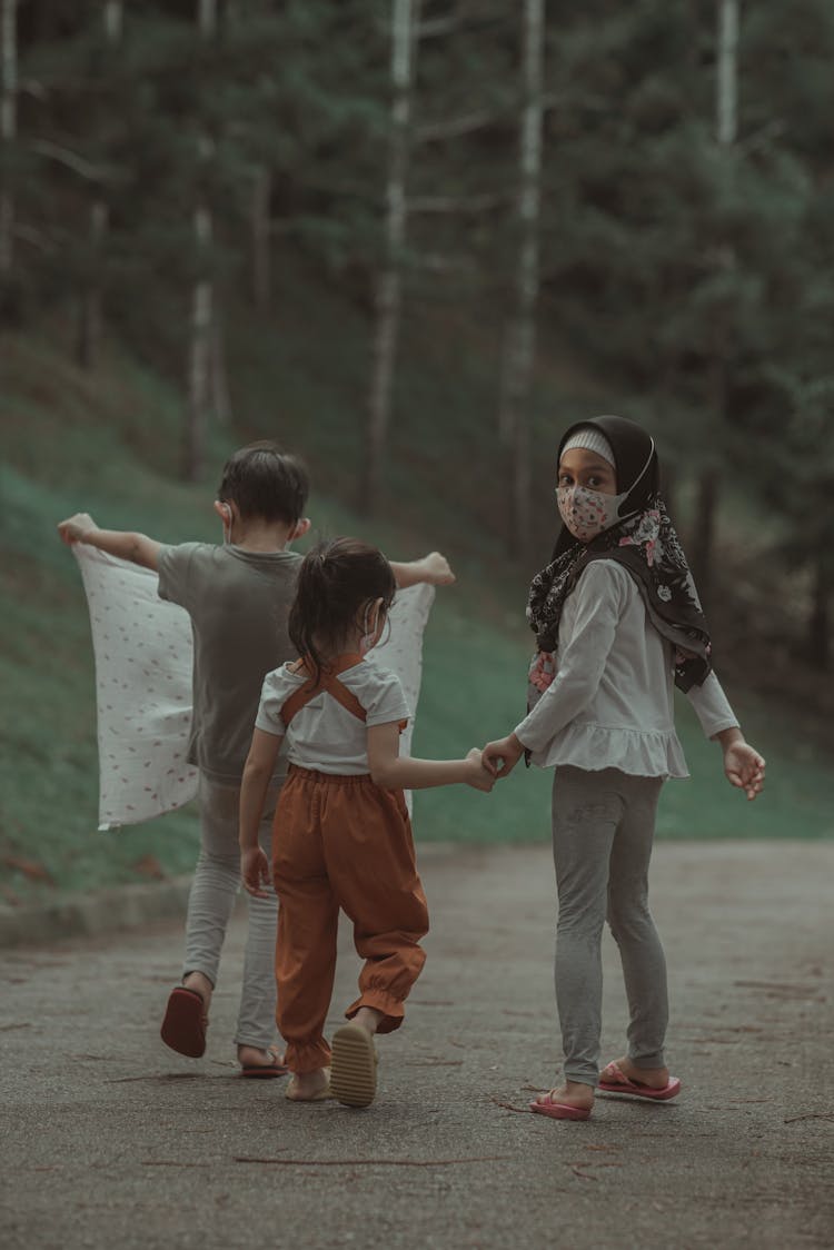 Children Walking On The Road