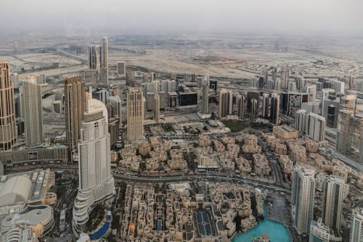 A breathtaking aerial view of Dubai's iconic skyscrapers and urban landscape.