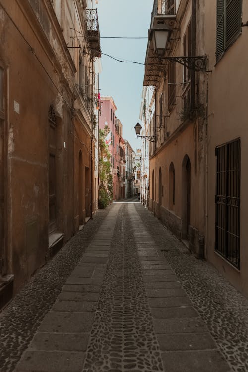 Narrow Cobblestone Alley in an Old Town 