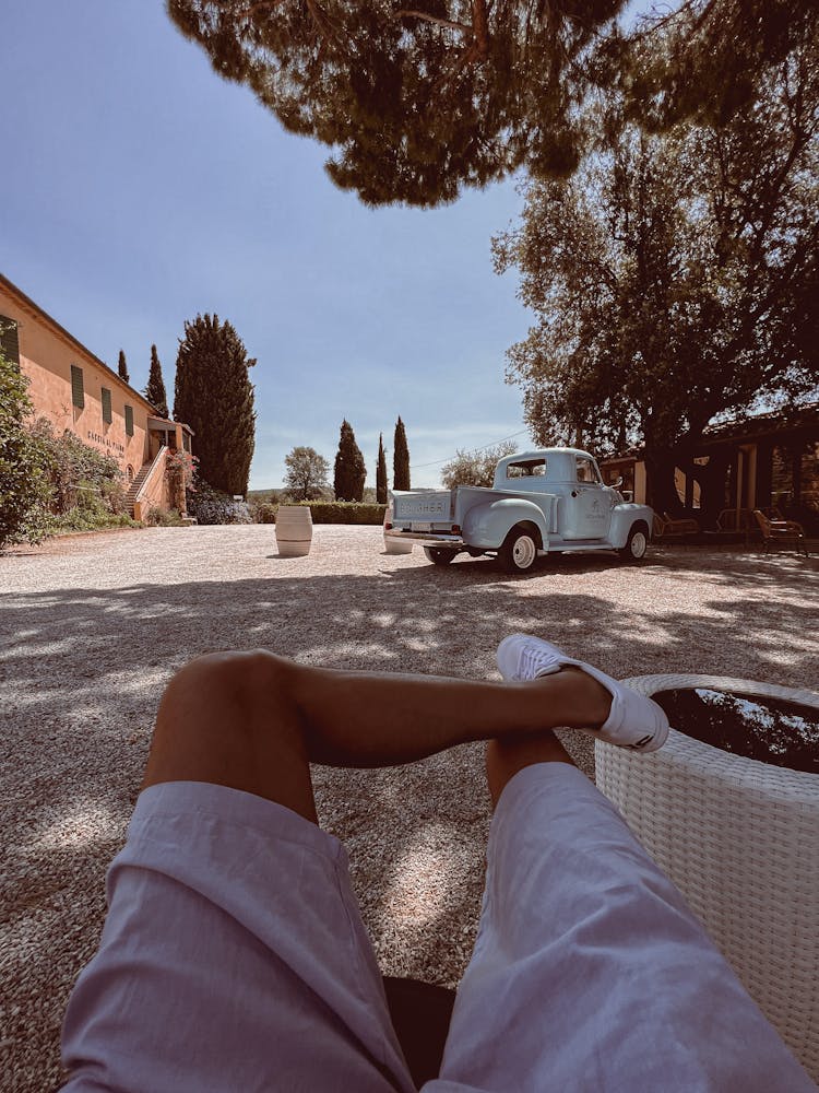 Man Relaxing In Yard On Summer Day