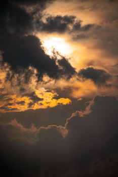 A breathtaking sunset with dramatic clouds and a warm golden glow, perfect for nature lovers.