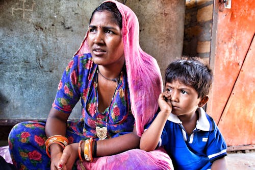 Indian Woman with Her Son on a Street