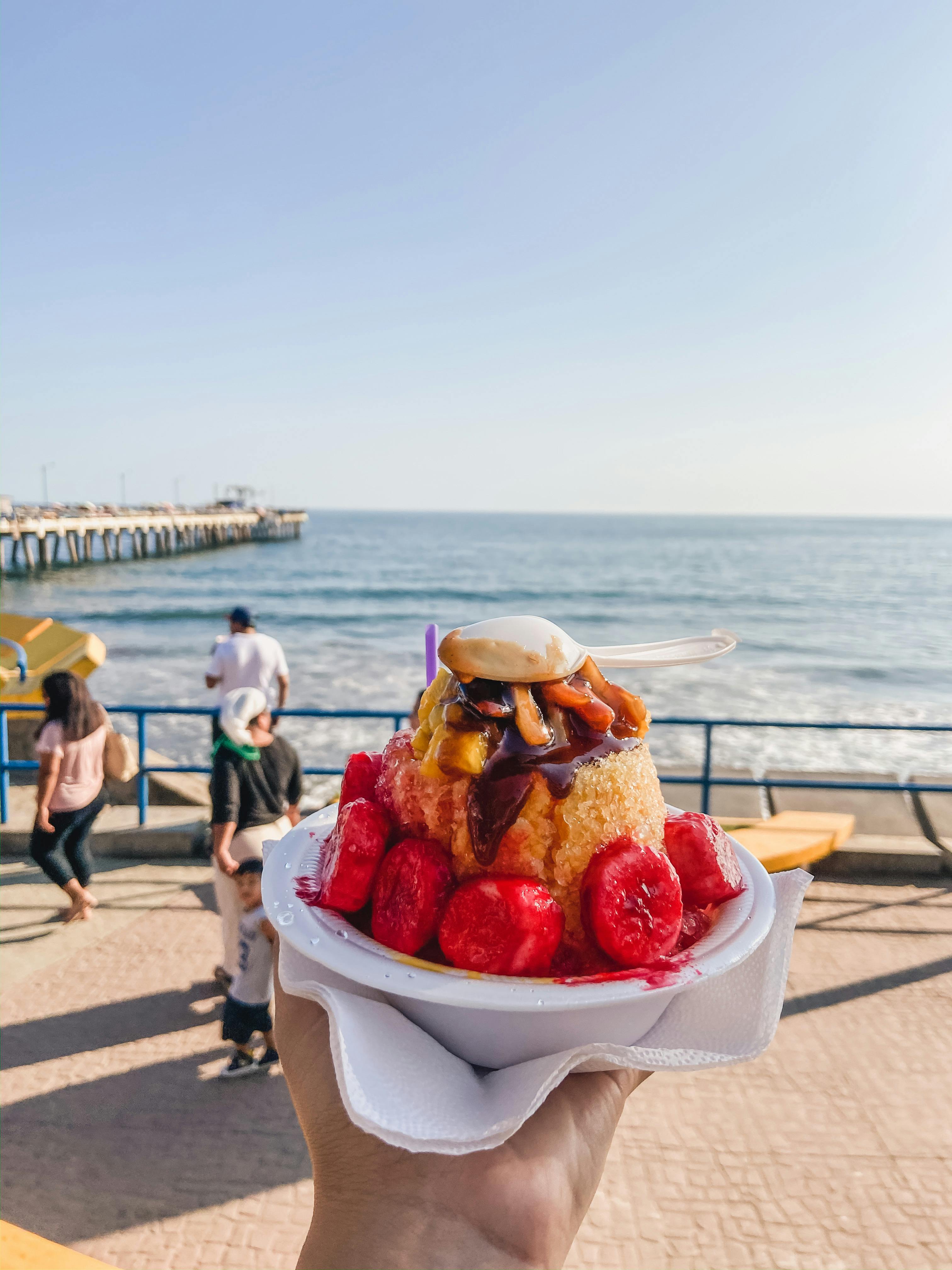 Free Snow Cone with Fruit Toppings and Syrup Stock Photo
