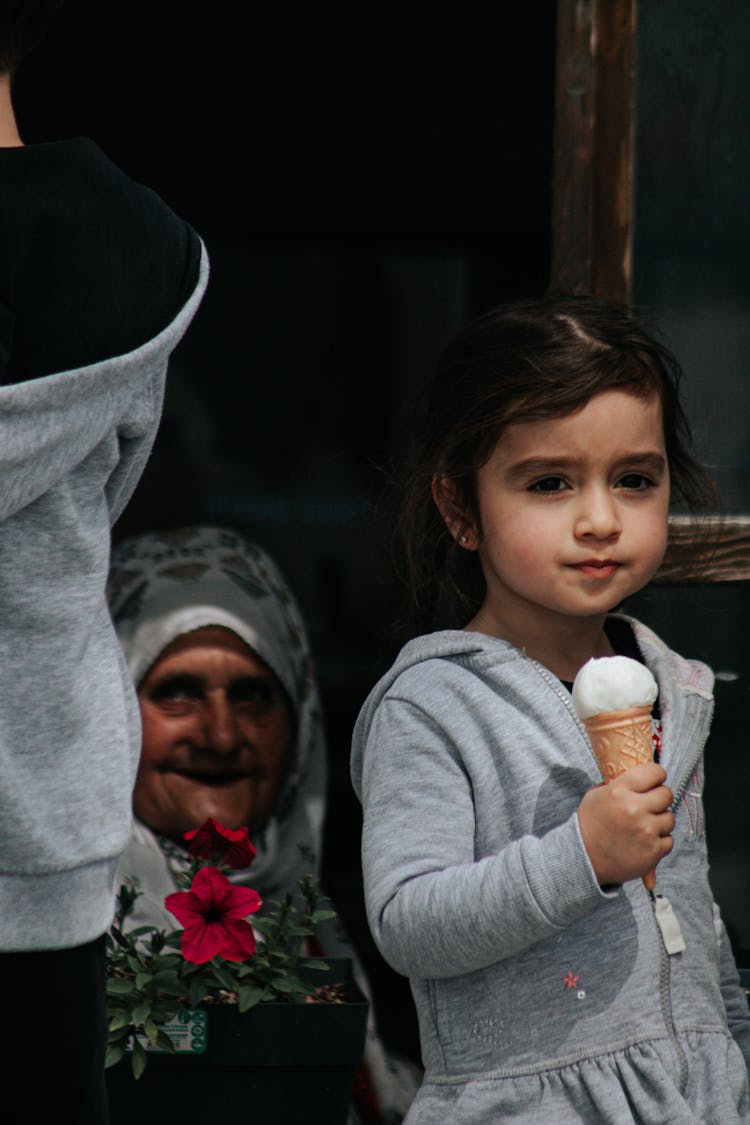 A Girl Holding Ice Cream