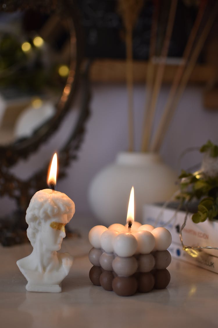 Close-Up Shot Of Burning Candles 