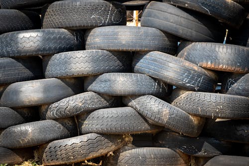 Free Stacked Vehicle Tire Lot Stock Photo