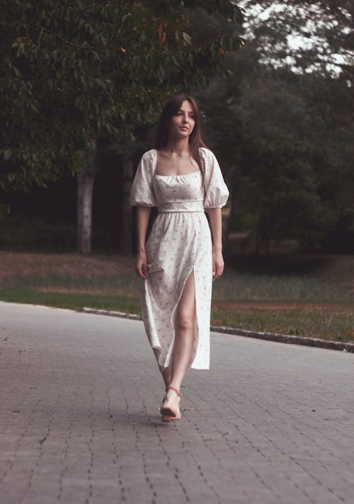 A Woman Walking in the Park