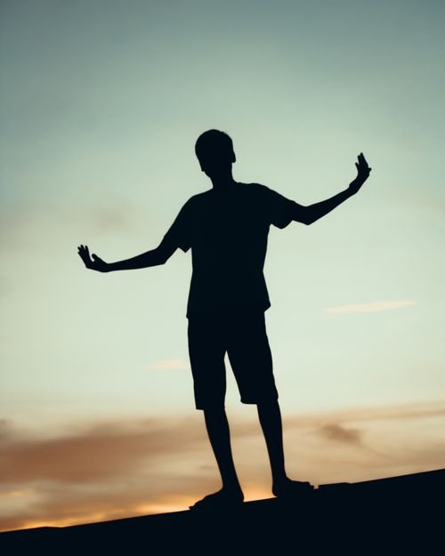 Free Silhouette of a man against a twilight sky in India, evoking tranquility. Stock Photo