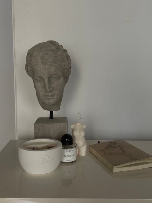 Sculpture and Minimalist Decoration on Shelf