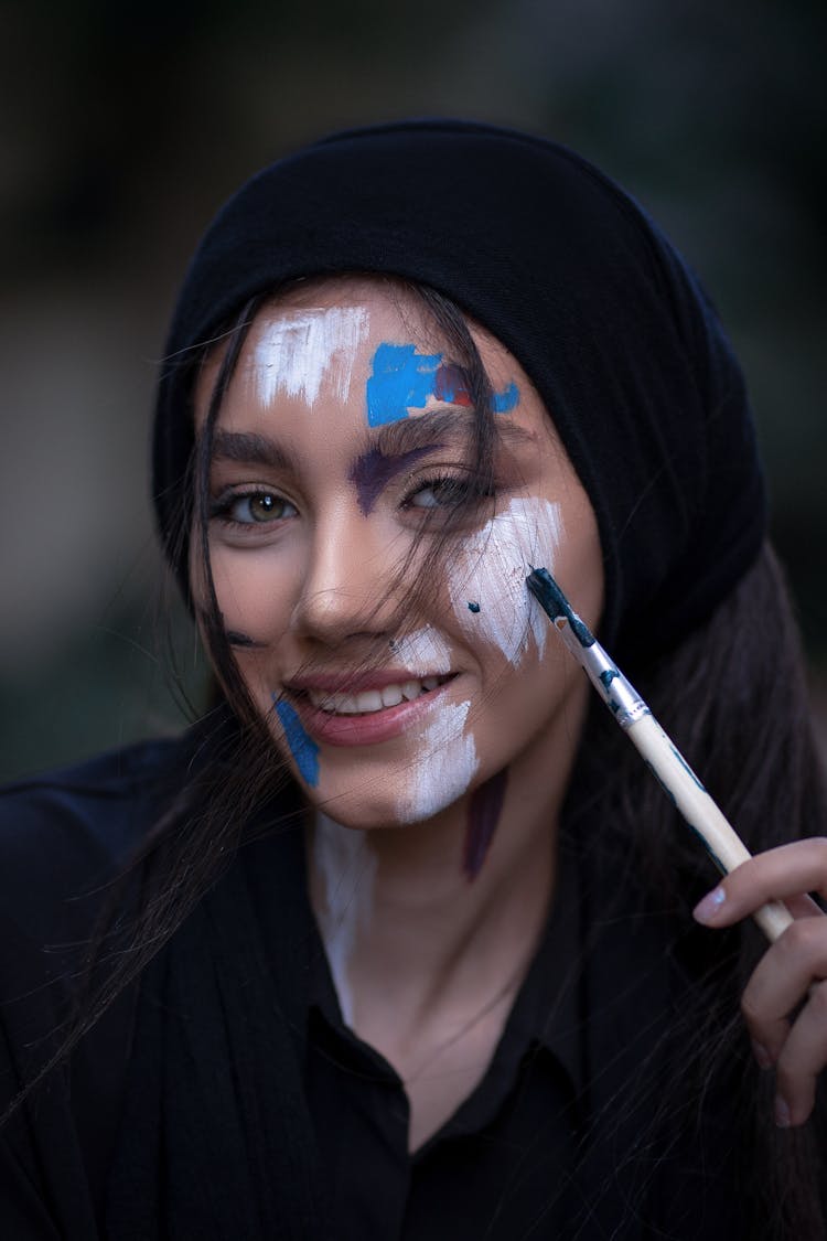 Woman With Paint On Face