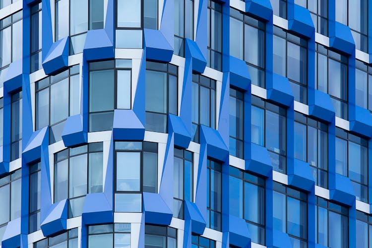 Blue And White Building With Glass Windows