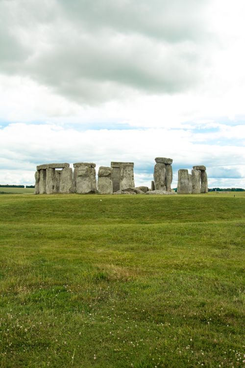 Free Iconic prehistoric Stonehenge in Wiltshire, England on a cloudy day, showcasing its ancient mystery. Stock Photo
