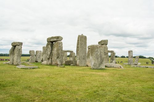 Free Iconic Stonehenge monument with gray rocks and cloudy sky in England. Stock Photo