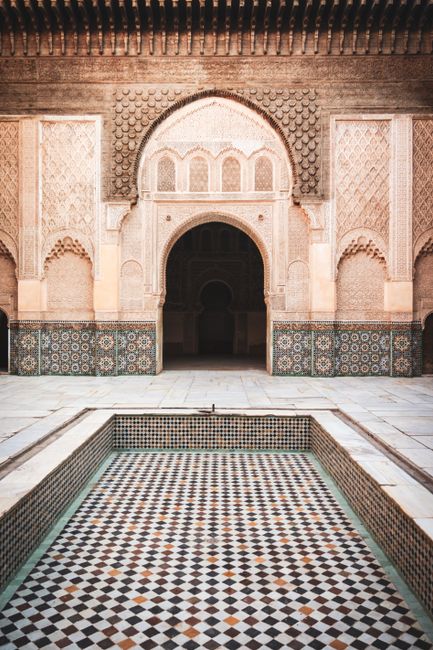 Stunning Moroccan architectural details of a historic courtyard in Marrakesh.