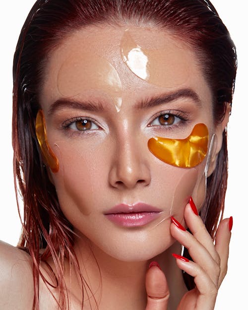 Free Woman with Under Eye Patches on Her Face Stock Photo