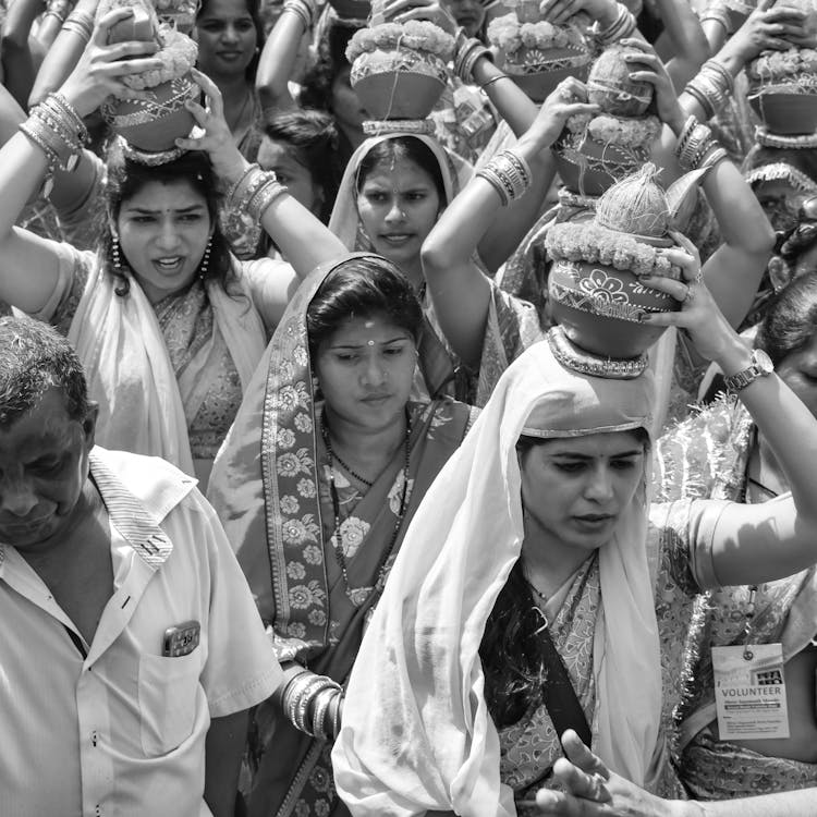 Crowd During The Religious Ceremony With Clay Pots On Heads