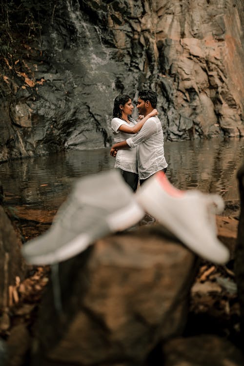 A Couple Getting Wet in the River 