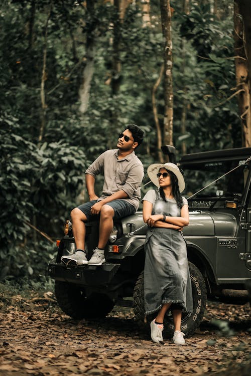 Couple Posing on a Jeep