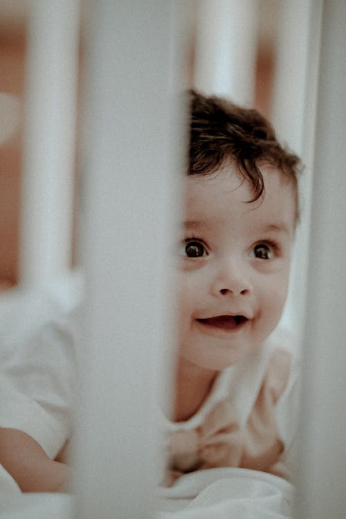 A Cute Baby In a Crib