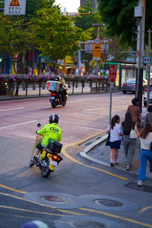 A Person Riding Motorcycle on the Street