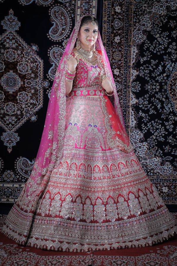 Bride in pink lehenga