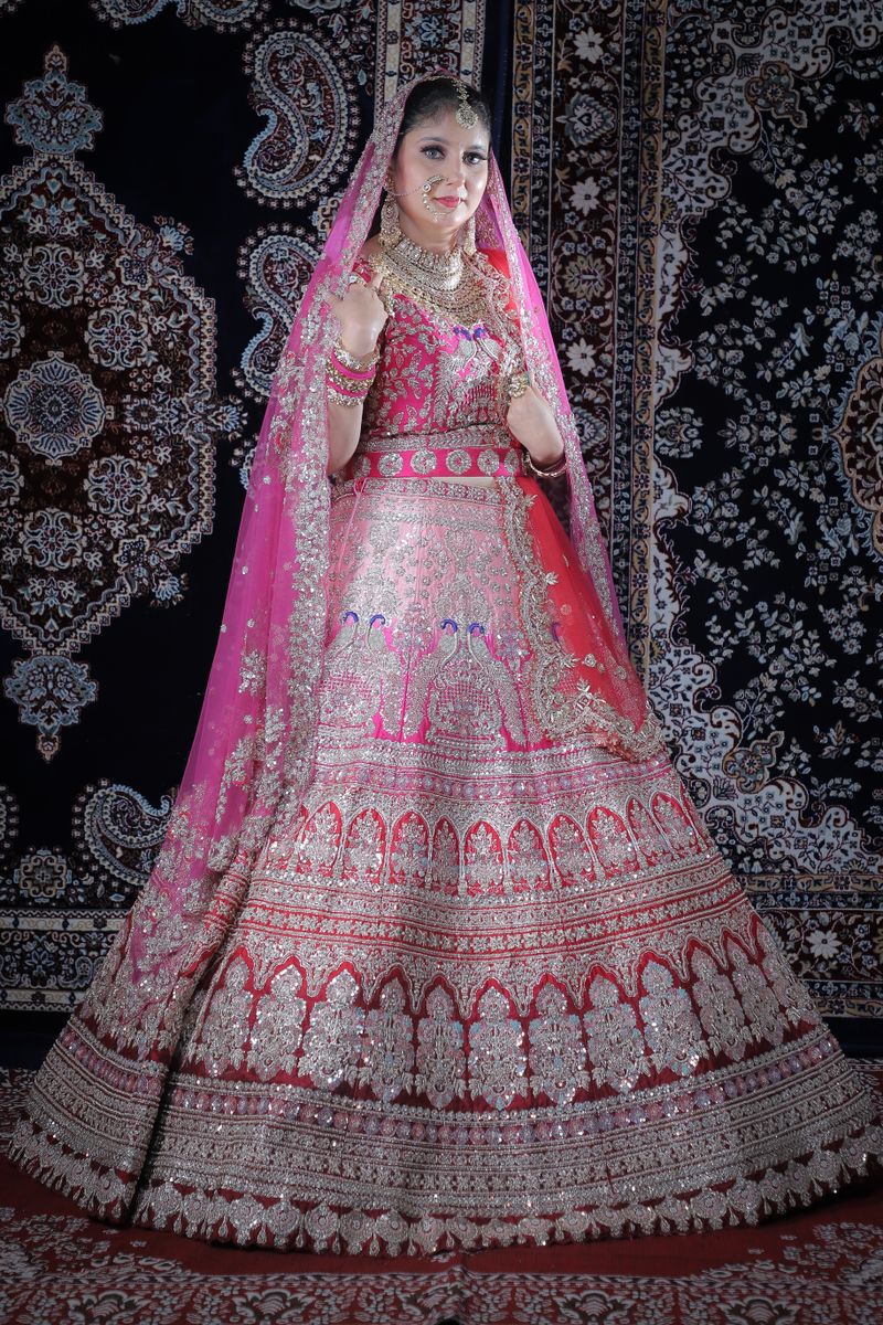 Bride in pink lehenga