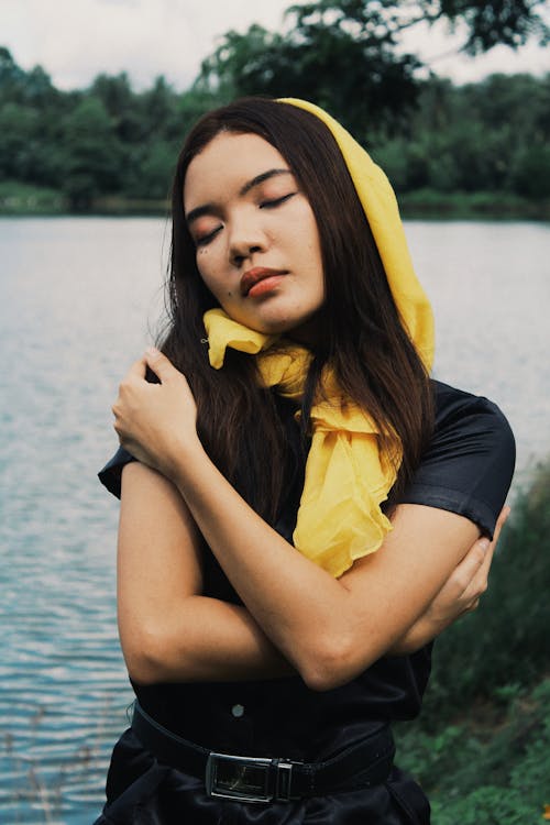 Close Up Photo of Woman with Her Arms Crossed