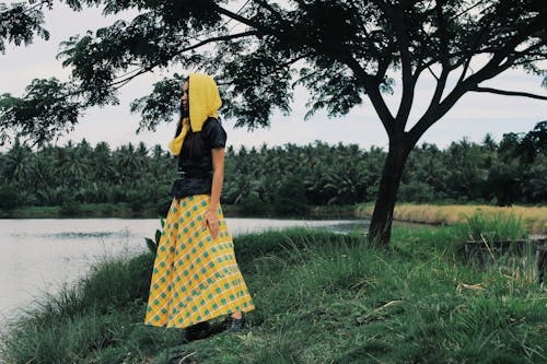 A Woman in Yellow Hijab