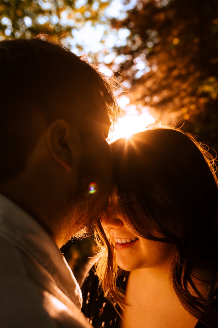 Close Up Photo Of Man Kissing A Woman